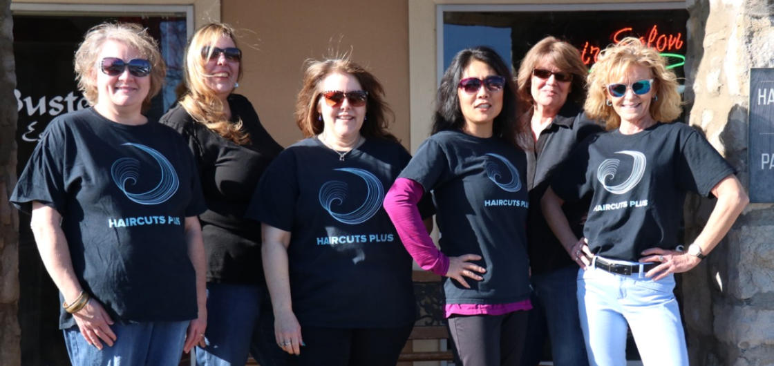 Haircuts Plus Staff outside hair salon